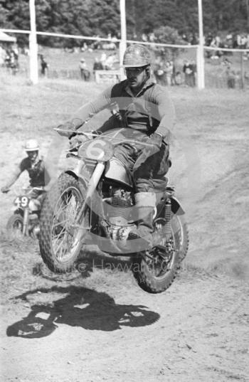 Airborne on the main straight, 1966 motocross meeting, Hawkstone.