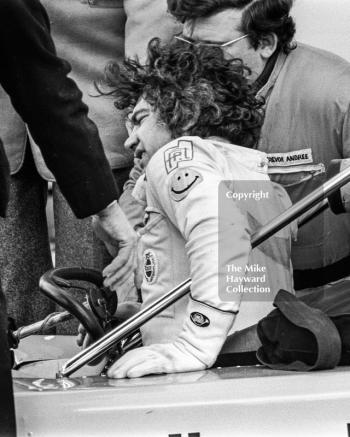 Alberto Colombo struggles out of his Trivellato Racing Team March 752 BMW after the chicane accident, Wella European Formula Two Championship, Thruxton, 1975
