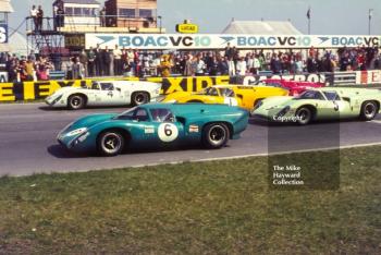 Leaving the grid at the start of the race are Trevor Taylor, Team Elite Lola T70; Brian Redman, Sid Taylor Lola T70; Jo Bonnier, Lola T70; and Frank Gardner, Grand Bahama Racing Lola T70, Wills Embassy Trophy Race, Thruxton, Easter Monday 1969.

