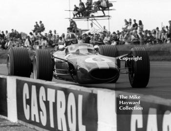 Graham Hill, Lotus Cosworth 49 R3, at Copse Corner, Silverstone, 1967 British Grand Prix.
