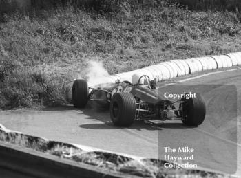 Tim Schenken, Sports Motors Brabham BT28, hits the bank at Shaw's Hairpin, Guards Formula 3 Trophy, Mallory Park, June 1969.
