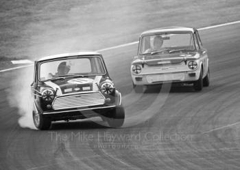John Rhodes, Cooper Car Company Mini Cooper S, leads Tony Lanfranchi, Alan Fraser Sunbeam Imp, at South Bank Bend, Brands Hatch, Grand Prix meeting 1968.
