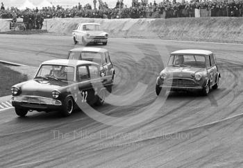 Mike Walker, Broadspeed Ford Anglia, ahead of Tony Youlten, Cars and Car Conversions Mini Cooper S, and Gordon Spice, Equipe Arden Mini Cooper S, Thruxton Easter Monday meeting 1968.
