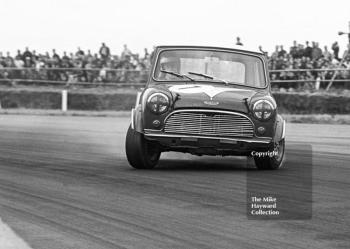 Barrie Williams, Mini Cooper 999cc, at Copse Corner, Silverstone, British Grand Prix meeting 1969.
