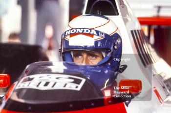 Alain Prost in the pits, McLaren MP4/5, Honda V10, during practice for the British Grand Prix, Silverstone, 1987.
