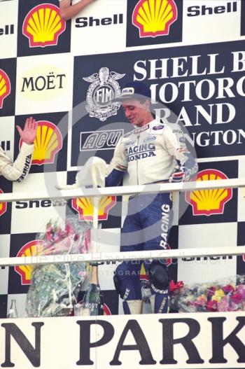 Luca Cadalora celebrates winning the 250cc Grand Prix, Donington Park, British Grand Prix 1991.