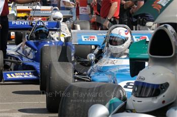 Simon Hadfield, 1969 Matra MS80 (pictured centre) in the paddock queue before the Grand Prix Masters race, Silverstone Cassic 2009.