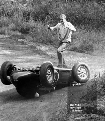 Marshals rush to the aid of John Creasey in his Lola at the Esses, Shelsley Walsh Hill Climb June 1967.
