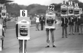 Name boards on the grid before the start of the 1981 British Grand Prix at Silverstone.
