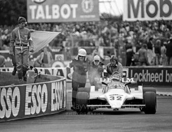 Jean Pierre Jarier, Osella FA1B, gets a push back to the pits during qualifying, Silverstone, British Grand Prix 1981.
