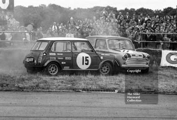Steve Neal, Britax Cooper Downton Mini Cooper S, and John Handley, British Leyland Mini Cooper S, have a coming together at Copse Corner, Silverstone, British Grand Prix meeting 1969.
