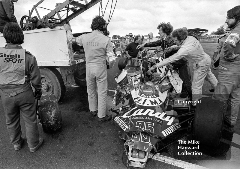 Marshalls retrieve the wreckage of Brian Henton's Toleman TG181, Silverstone, British Grand Prix 1981.