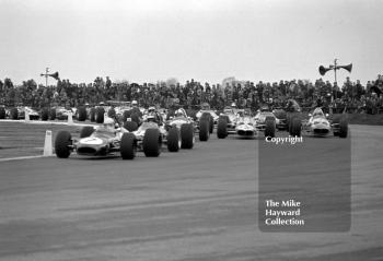 Richard Scott, Brabham, leads the pack at Copse Corner, Silverstone, during the 1970 International Trophy.
