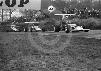 Graham Hill, Gold Leaf Team Lotus 49B V8, ahead of Jochen Rindt, Lotus 49B V8, and Jack Brabham, Brabham BT26, Brands Hatch, 1969 Race of Champions.
