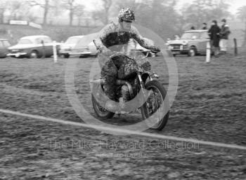 Rider covered in mud, Hatherton Hall Farm motocross, 1967