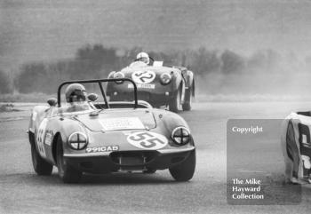 Ken Heywood, Elva Courier Mk 1 (991 CAB), followed by Andrew Ledingham, Triumph TR3A (33 DNK), Philips Car Radio Thoroughbred Sports Car race, F2 International meeting, Thruxton, 1977.
