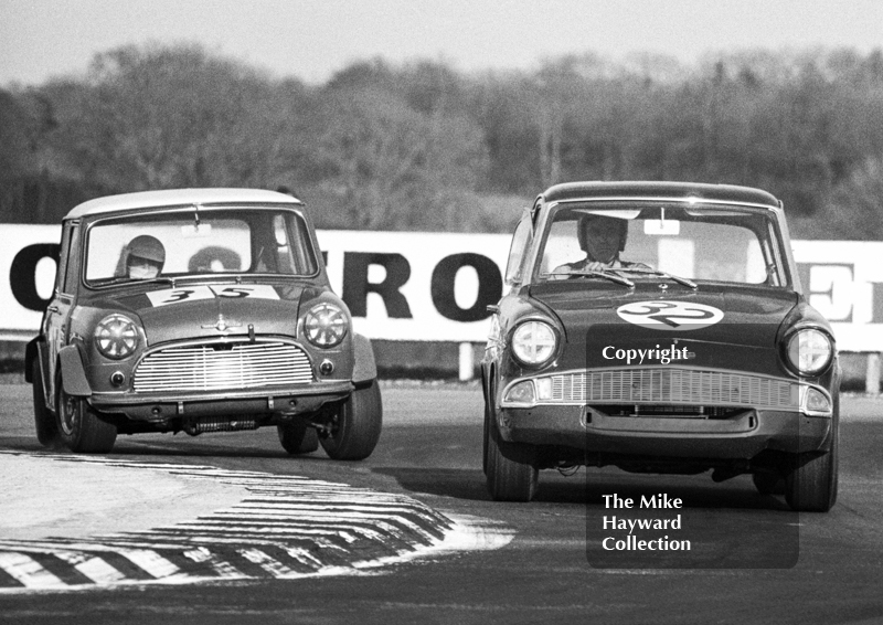 Leslie Nash, Ford Anglia, and Rob Mason, Mini Cooper S, Thruxton Easter Monday meeting 1969.
