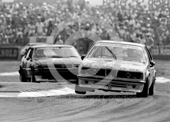 Hans Stuck, Cheylesmore BMW Motorsport BMW 635 CSi, followed by Gordon Spice, Rover Vitesse, Trimoco British Saloon Car Championship race, British Grand Prix, Silverstone, 1983.
