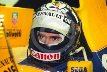 Damon Hill, Williams Renault FW15C, in the pit garage at Silverstone for the 1993 British Grand Prix.
