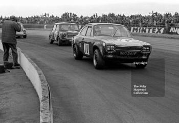 Chris Craft, Team Broadspeed Ford Escort, and John Rhodes, British Leyland Mini Cooper S, Silverstone, British Grand Prix meeting 1969.
