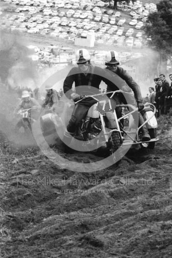 Sidecars kick up dust on the hill, 1966 motocross meeting, Hawkstone.