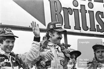 Jean-Pierre Jarier, Tyrrell, Clay Regazzoni, Williams, and Rene Arnoux, Renault, on the podium at the Silverstone 1979 British Grand Prix.
