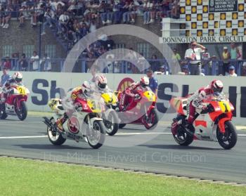 Wayne Rainey, Marlboro Team Roberts Yamaha, leads Kevin Schwantz, Team Lucky Strike Suzuki, off the line, Donington Park, British Grand Prix 1991.