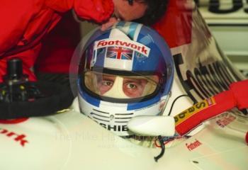 Derek Warwick, Footwork Mugen Honda FA14, in the pits at Silverstone for the 1993 British Grand Prix.
