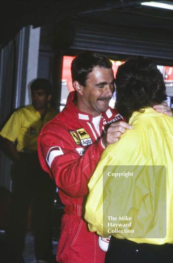 Nigel Mansell in the pits during practice for the British Grand Prix, Silverstone, 1989.
