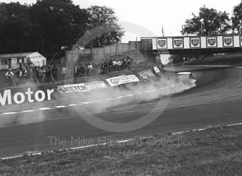 John Rhodes, Cooper Car Company Mini Cooper S, smoking through South Bank Bend during practice, Brands Hatch, Grand Prix meeting 1968.
