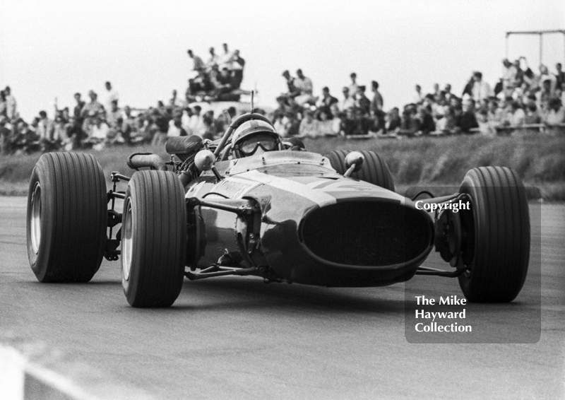 Pedro Rodriguez, Cooper Car Company Cooper Maserati V12 T81, at Copse Corner, Silverstone, British Grand Prix, 1967.