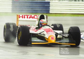 Alessandro Zanardi, Lotus 107B, seen during wet qualifying at Silverstone for the 1993 British Grand Prix.
