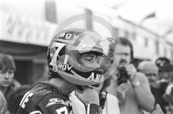 Barry Sheene puts on helmet, Donington Park 1980.