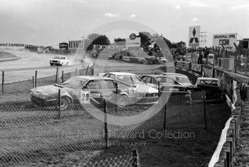 A very expensive car park at Woodcote Corner, Istel Tourist Trophy, European Touring Car Championship, Silverstone, 1984
