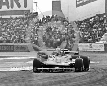 Gilles Villeneuve, Ferrari 312T4 V12, at Woodcote, Silverstone, British Grand Prix 1979.
