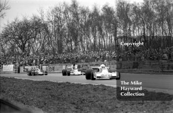 Alan Jones, Durex Surtees TS19, followed by James Hunt, Marlboro McLaren M23 and Niki Lauda, Ferrari 312T/2, Race of Champions, Brands Hatch, 1976.
