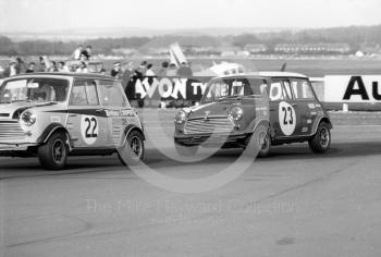 Steve Neal, Britax Cooper Downton Mini Cooper S, and John Rhodes, British Leyland Mini Cooper S, Thruxton Easter Monday meeting 1969.
