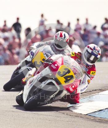 Kevin Schwantz, Team Lucky Strike Suzuki, and Mick Doohan, Rothmans Honda, Donington Park, British Grand Prix 1991.