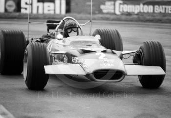 Jochen Rindt, Gold Leaf Team Lotus Ford 49B R9, at Copse Corner, Silverstone, International Trophy 1969.
