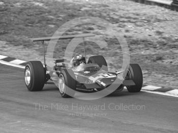 Race winner Jo Siffert, Rob Walker Lotus Cosworth V8 49B R7, at Paddock Bend, British Grand Prix, Brands Hatch, 1968.
