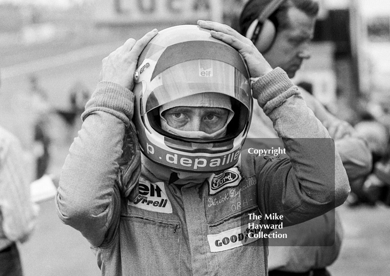 Patrick Depailler puts on his helmet, Brands Hatch, British Grand Prix 1974.