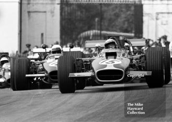 Mike Walker, Alan McKechnie Racing Lola T142, followed by Keith Holland, Lola T142, Oulton Park Gold Cup meeting 1969.
