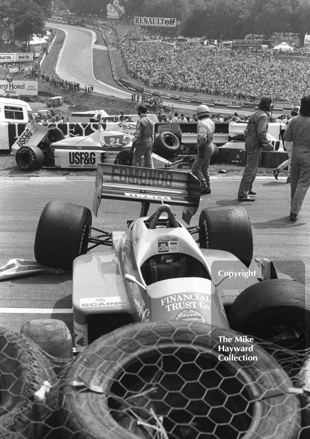 The Osella FA1H of Allen Berg amid the wreckage after first lap accident, Brands Hatch, British Grand Prix 1986.