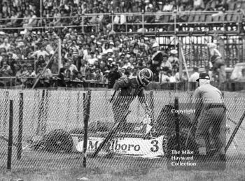 Eddie Jordan, March 793 Toyota, in the catch fencing on lap 19 during the Formula 3 race, Silverstone, British Grand Prix 1979.
