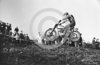 Airborne rider, motorcycle scramble at Spout Farm, Malinslee, Telford, Shropshire between 1962-1965