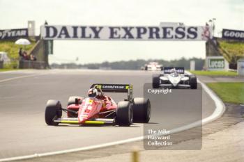 Stefan Johansson, Ferrari 156/85, leads Nelson Piquet, Brabham BT54, Silverstone, British Grand Prix, 1985.
