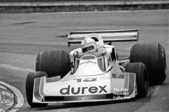 Alan Jones at Druids Hairpin with the Durex Surtees TS19 on the way to second place, Race of Champions, Brands Hatch, 1976.
