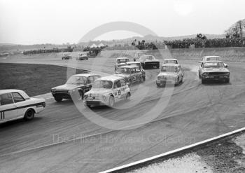 On the first lap at Campbell Bend are Ab Goedemans, SRT Holland Fiat Abarth 1000 Berlina, John Fitzpatrick, Broadspeed Ford Escort, Tony Youlten, Cars and Car Conversions Mini Cooper S, and Toine Hezemans, SRT Holland Fiat Abarth 1000 Berlina, Thruxton Easter Monday meeting 1968.
