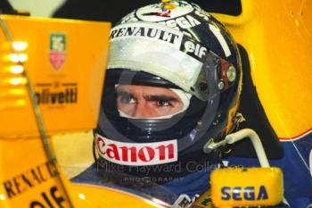 Damon Hill, Williams Renault FW15C, in the pit garage at Silverstone for the 1993 British Grand Prix.
