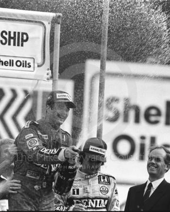 Nigel Mansell celebrates after winning the race, Brands Hatch, British Grand Prix 1986.
